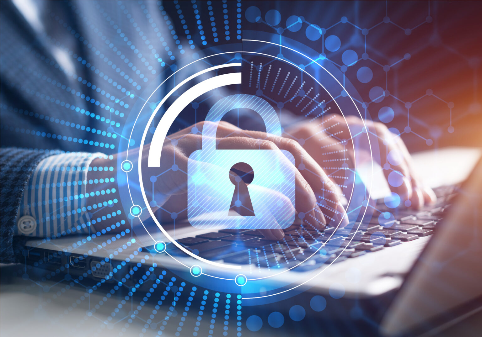 Hands typing on a laptop with a digital padlock and network graphics